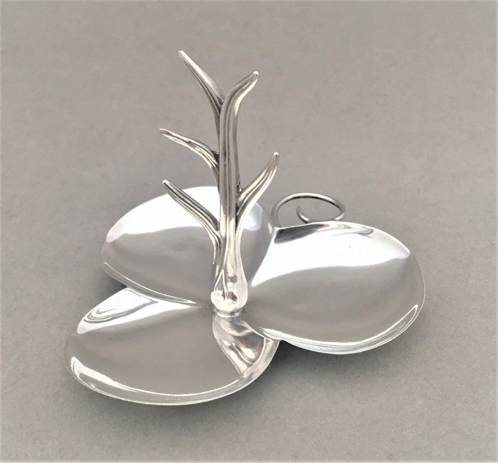 A delightful Edwardian silver ring tree