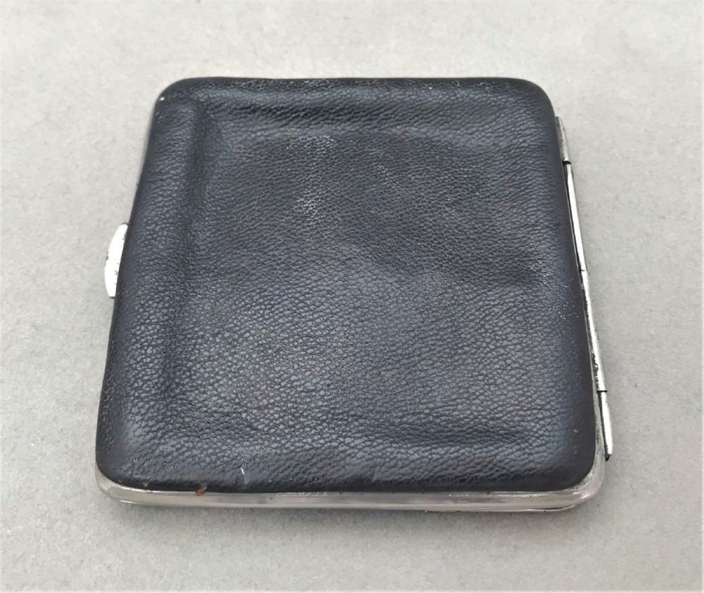 A gorgeous silver mounted purse View V