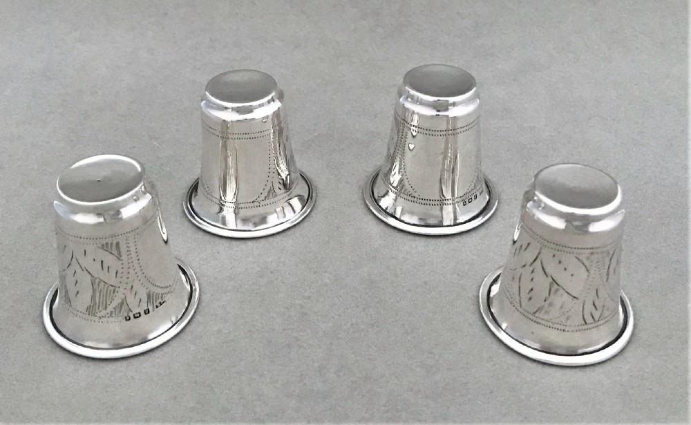 A rare set of four hallmarked silver shot or tot cups View III