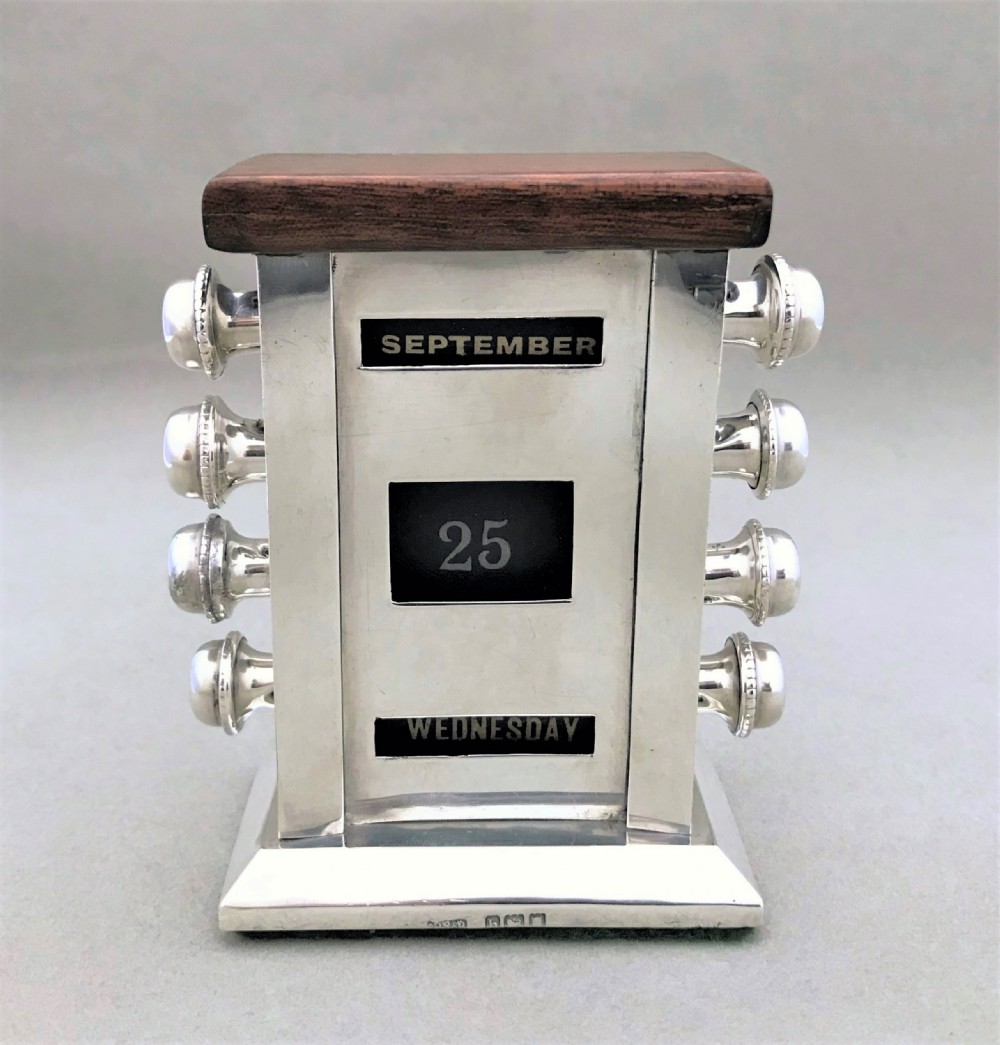 A handsome Edwardian silver desk calendar