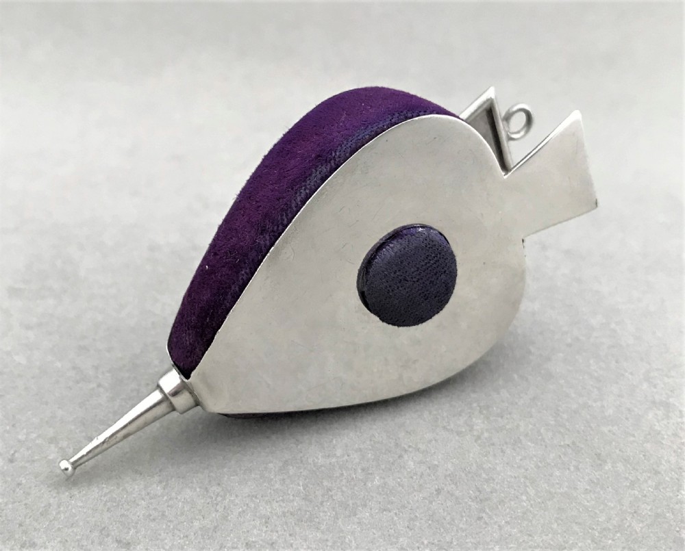 A rare novelty Bellows silver pin cushion