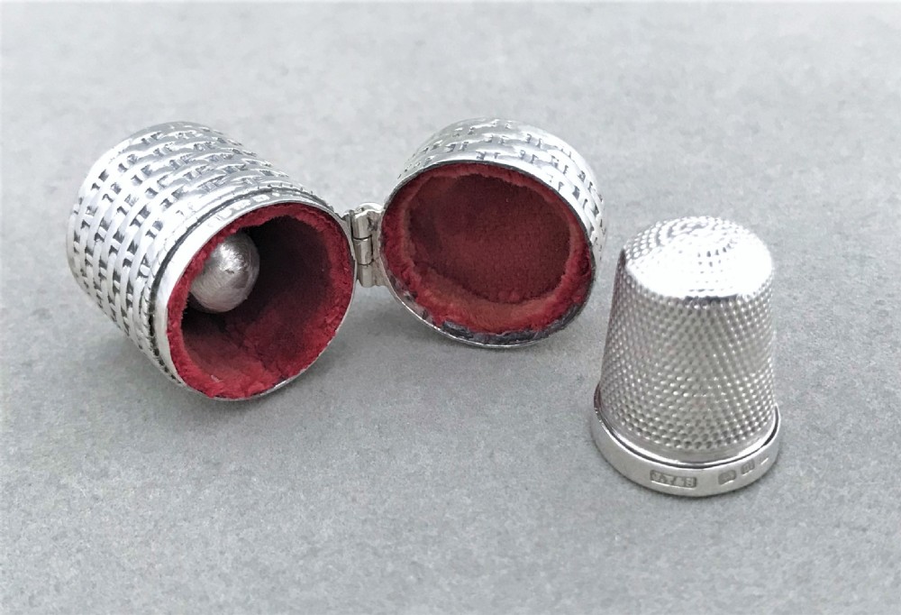 A Victorian silver thimble case & thimble View V