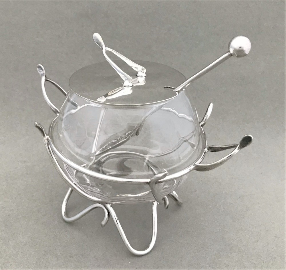 A charming silver plated preserve jar
