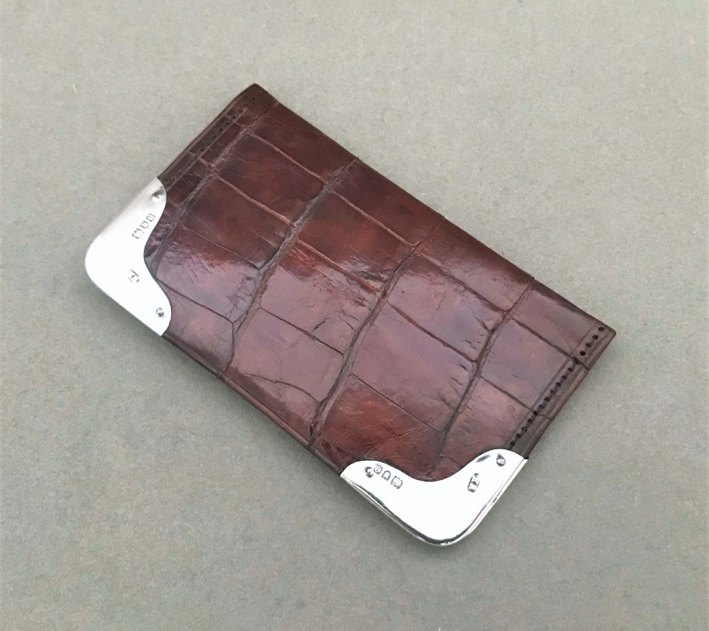 A delightful silver mounted wallet or purse