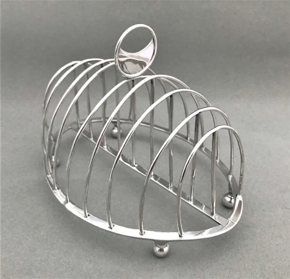 A fabulous 18th Century silver toast rack View III