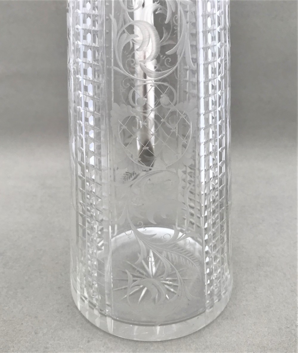 A delightful silver plated claret jug View V