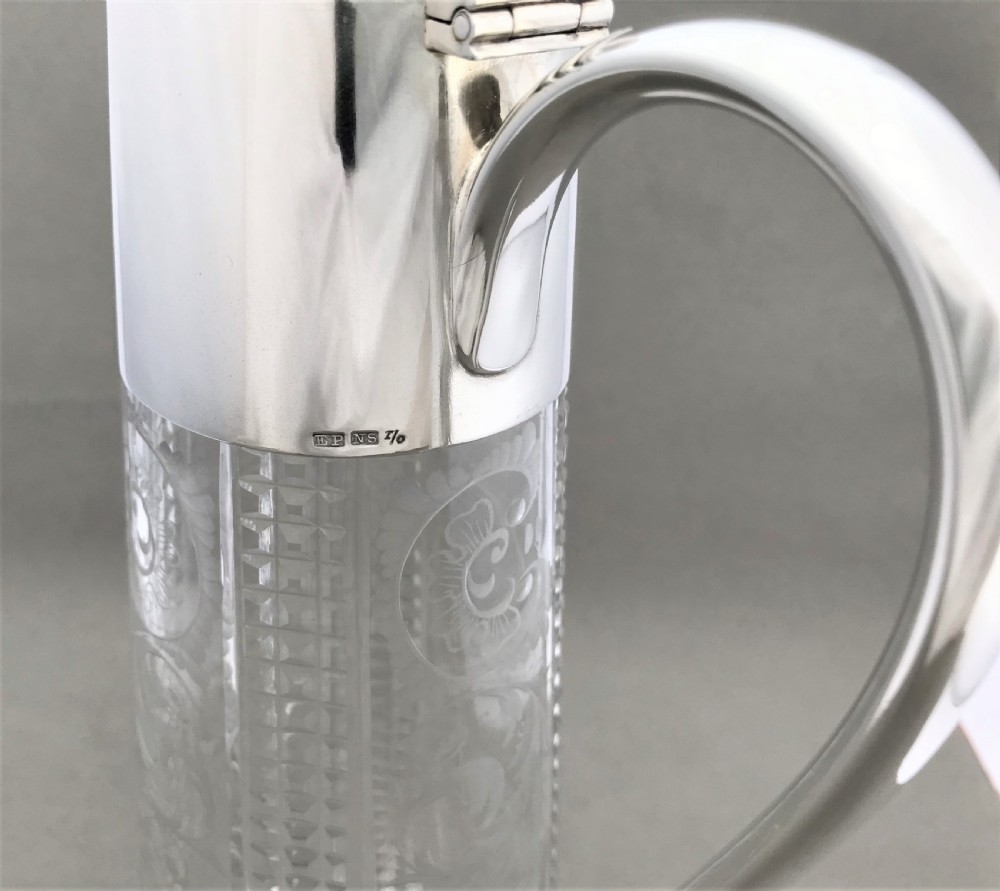 A delightful silver plated claret jug View IX
