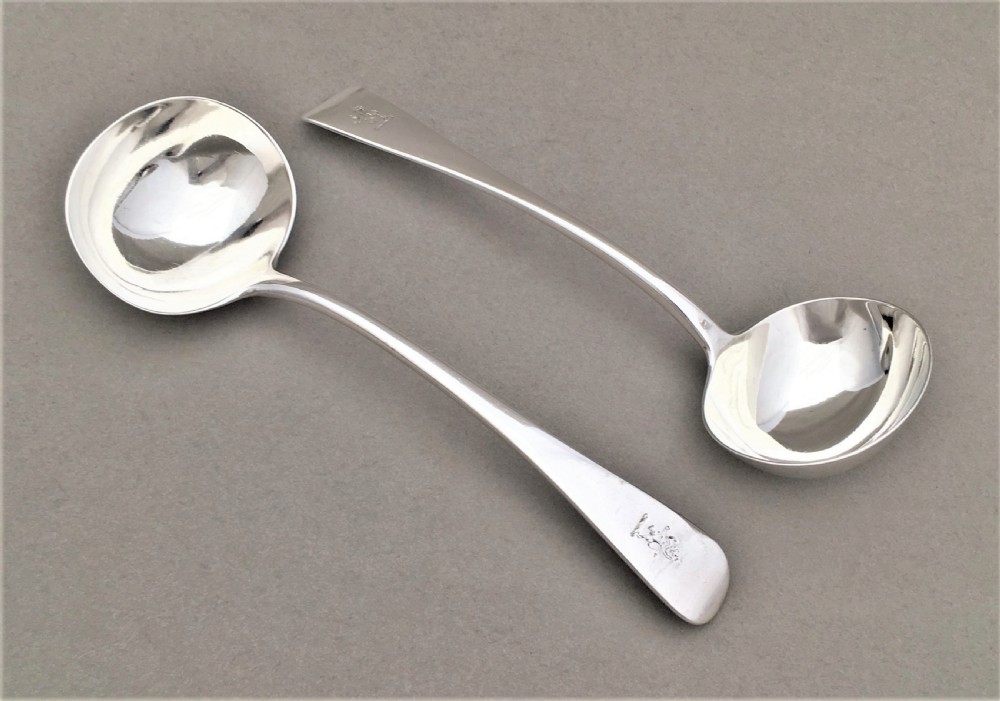 A pair of Victorian silver gravy ladles by George Adams