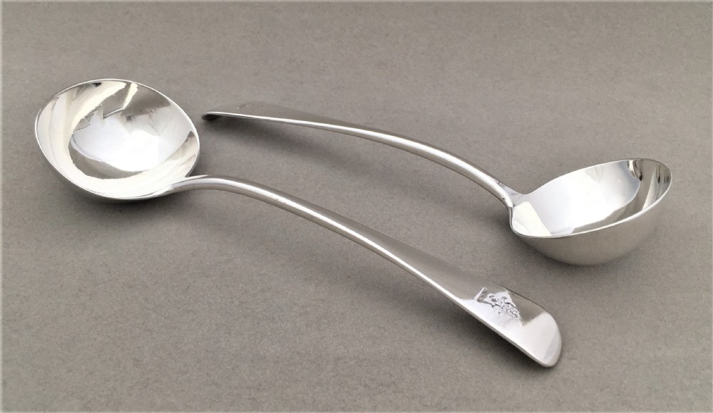 A pair of Victorian silver gravy ladles by George Adams View II