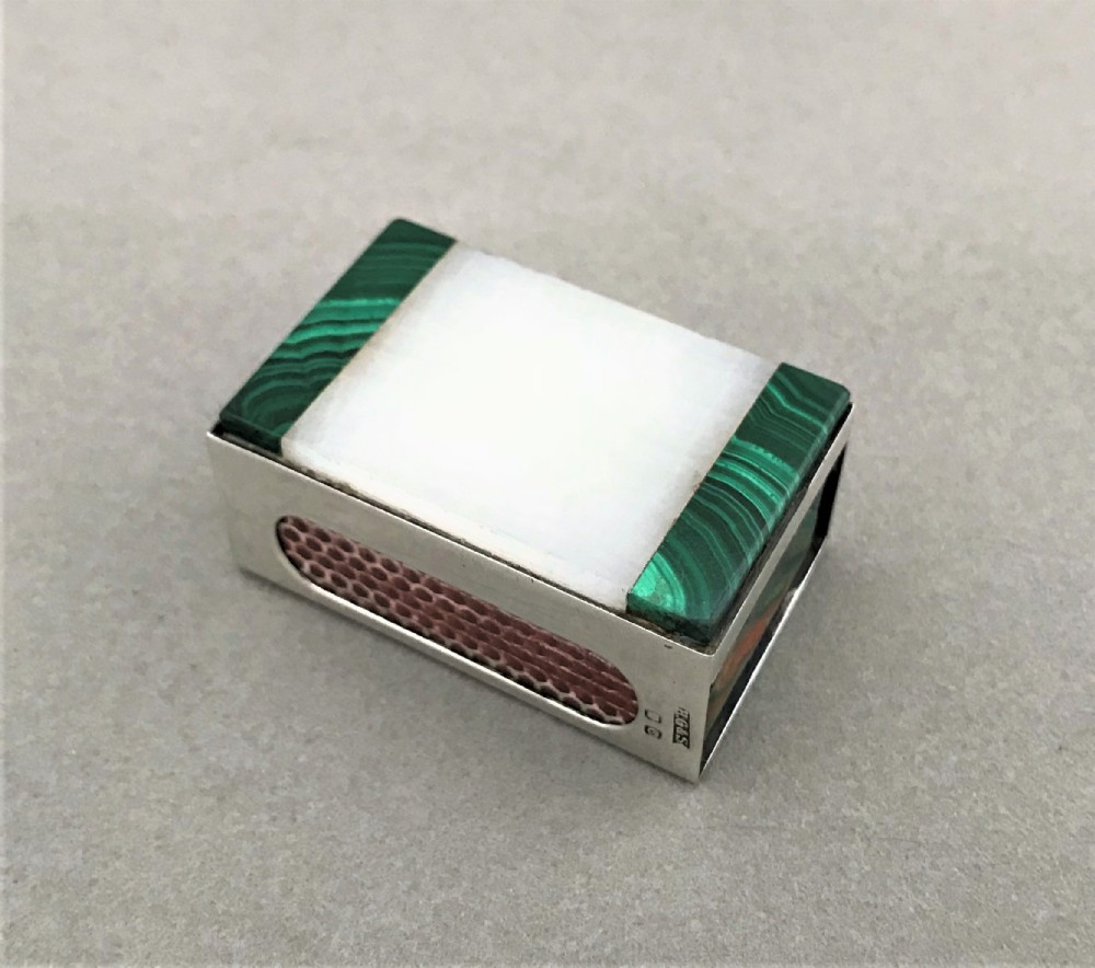 An attractive silver match box case