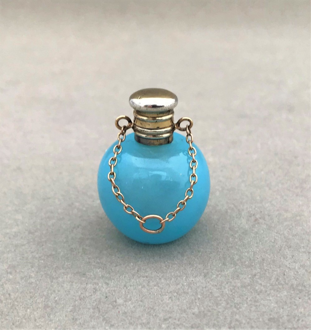 An exquisite silver mounted miniature scent bottle