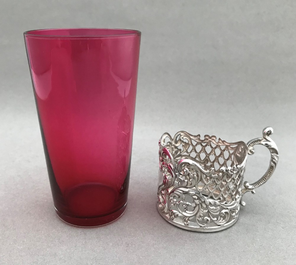 A lovely silver beaker holder with cranberry beaker View IV