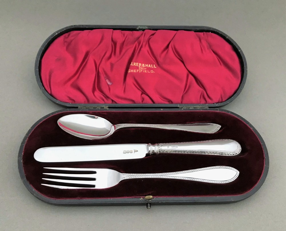 A stylish three piece silver Christening set
