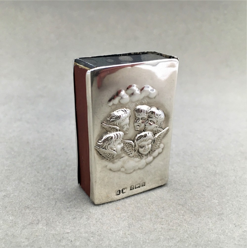 A silver Reynolds Angels embossed matchbox case View II