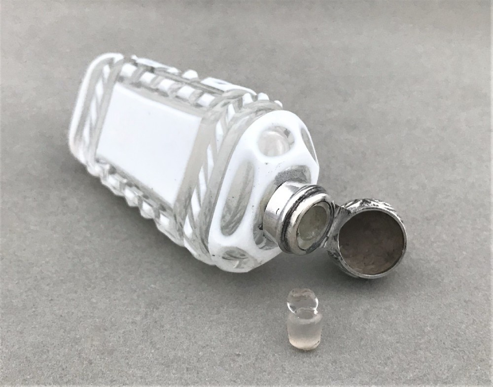 A Fabulous silver mounted cut through scent bottle View V