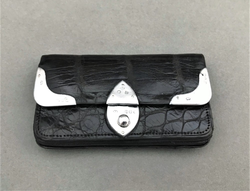 A delightful Victorian silver mounted purse