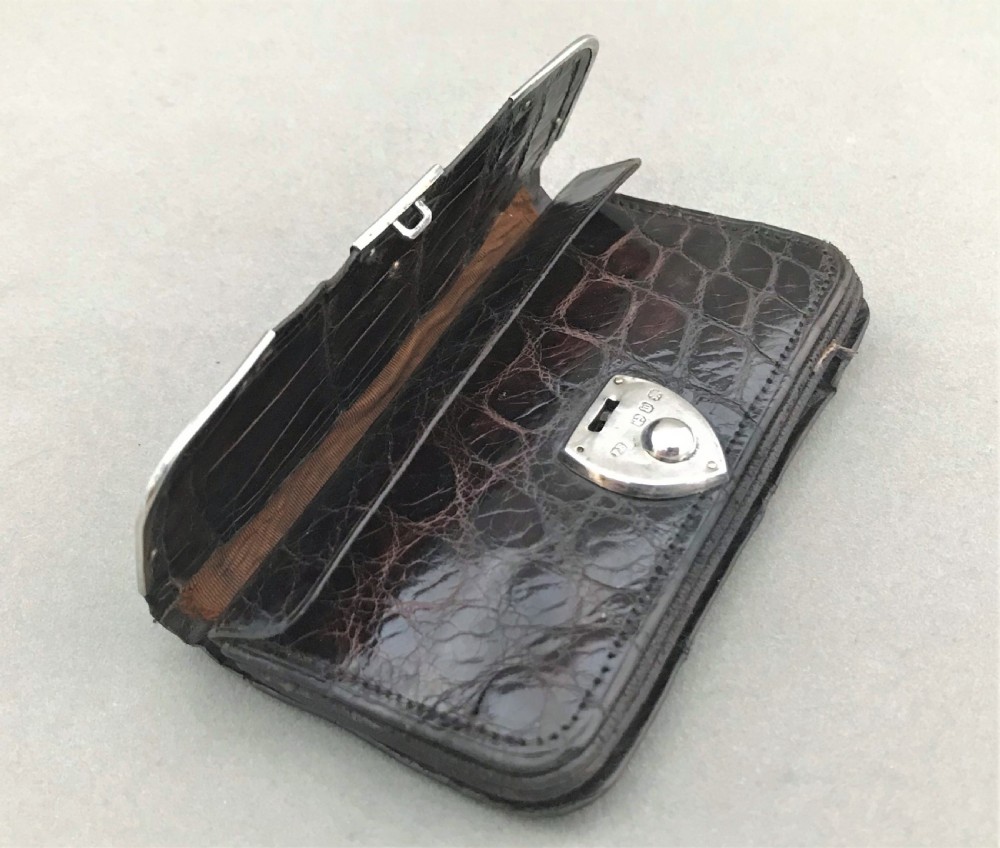 A delightful Victorian silver mounted purse View V