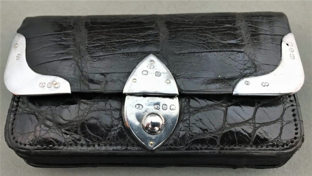 A delightful Victorian silver mounted purse View VI