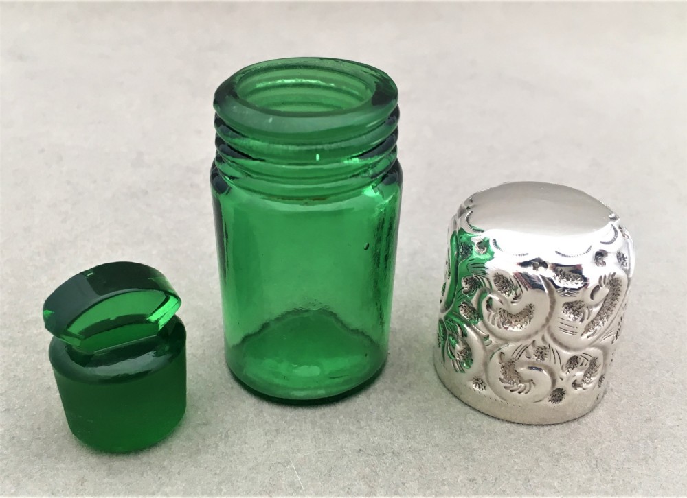 A silver mounted Edwardian scent bottle View V