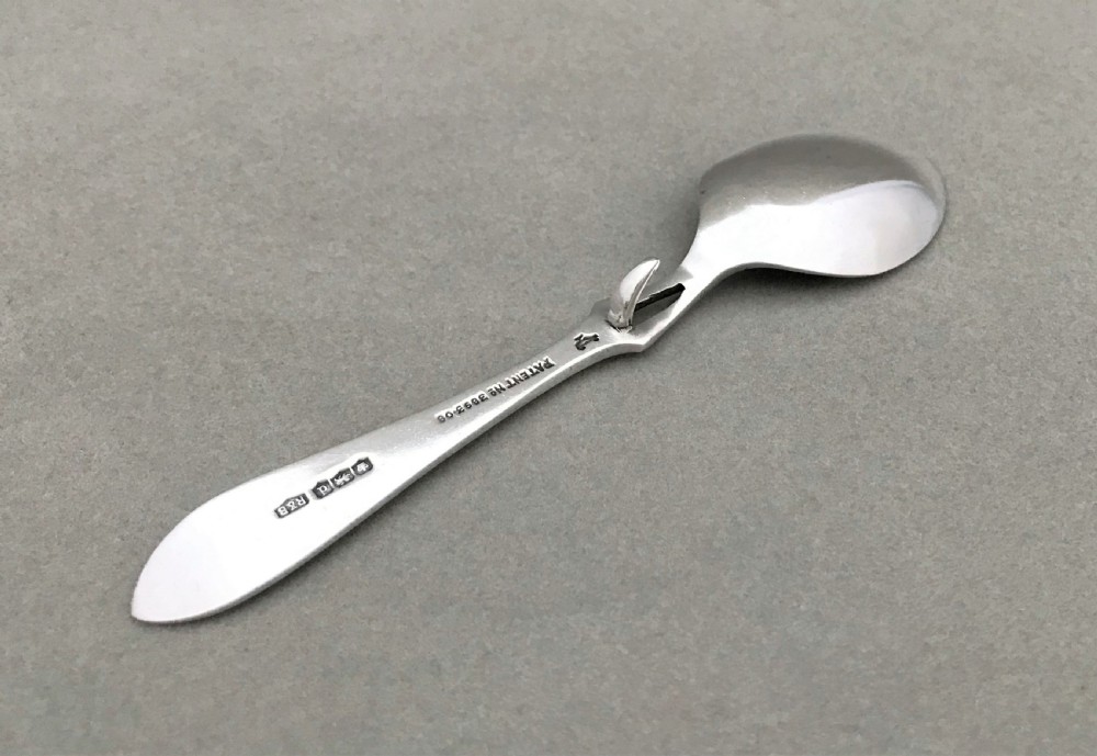 A desirable George V silver honey spoon View II