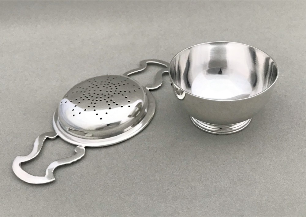A charming silver tea strainer & drip cup View III