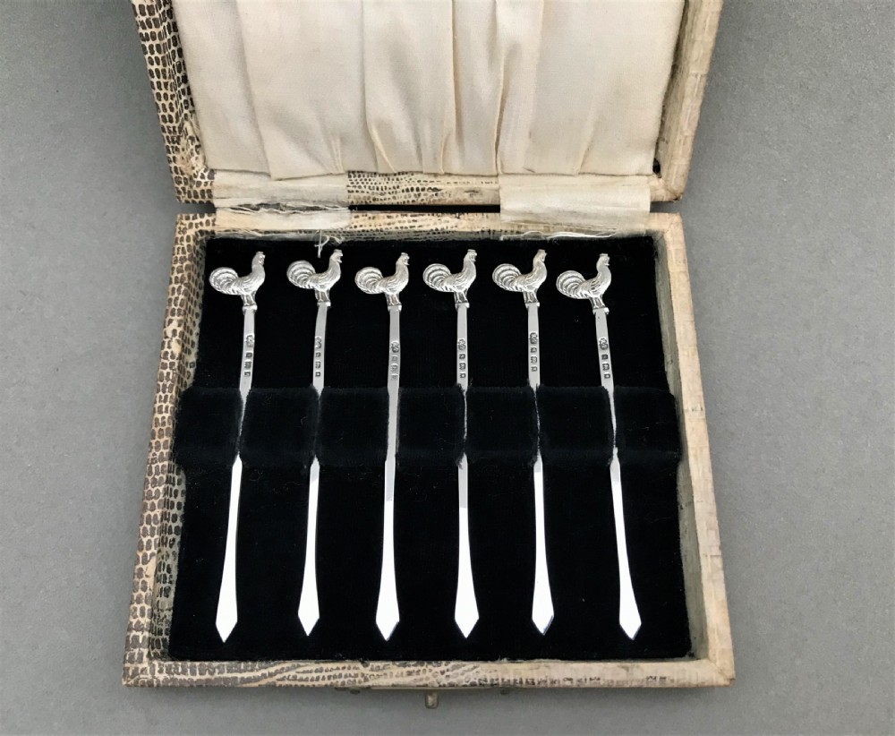 A hallmarked set of silver cockerel cocktail sticks View II