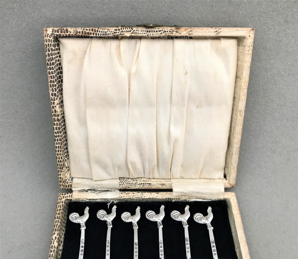 A hallmarked set of silver cockerel cocktail sticks View III