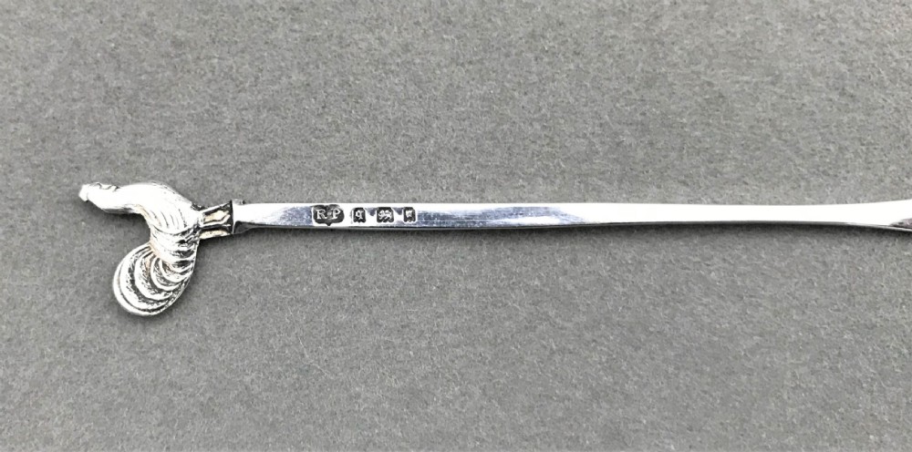 A hallmarked set of silver cockerel cocktail sticks View VIII