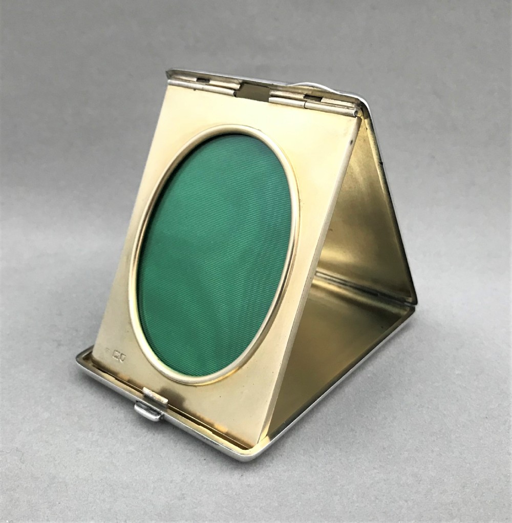 A fabulous silver travelling photograph frame by William Comyns