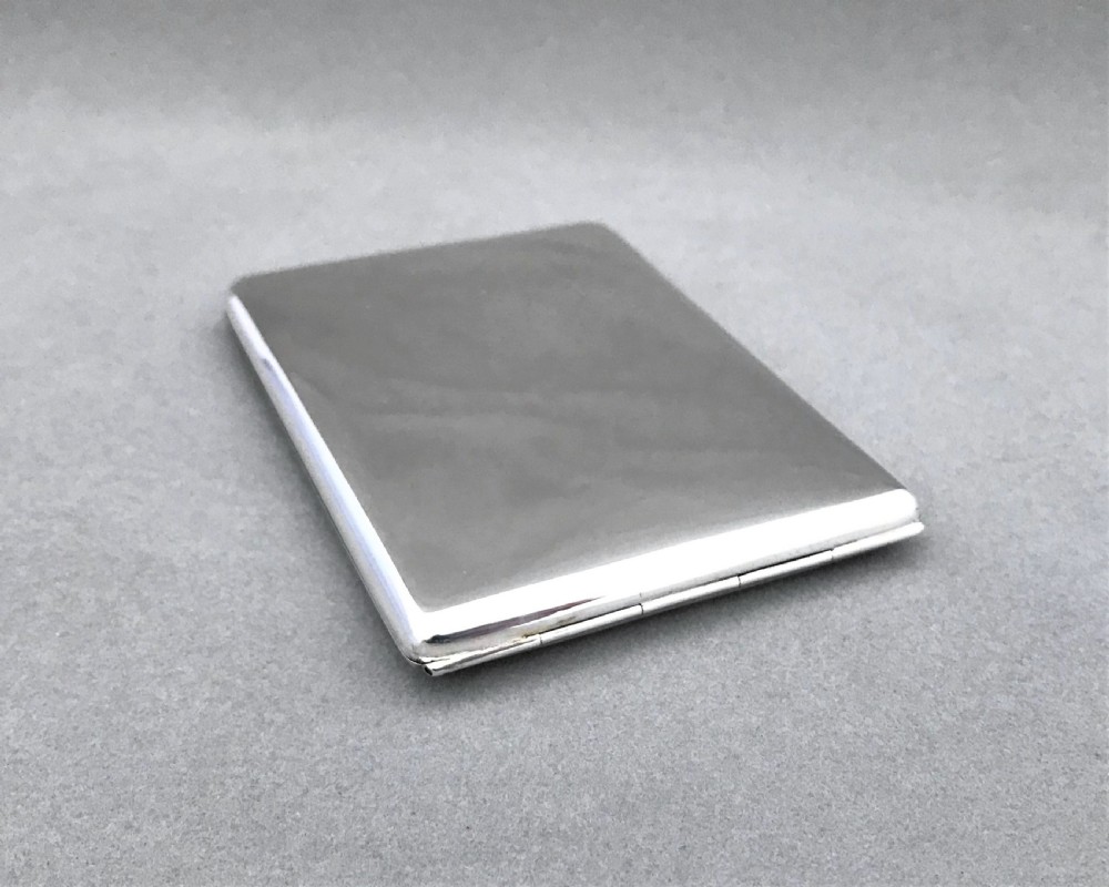 A fabulous silver travelling photograph frame by William Comyns View IX