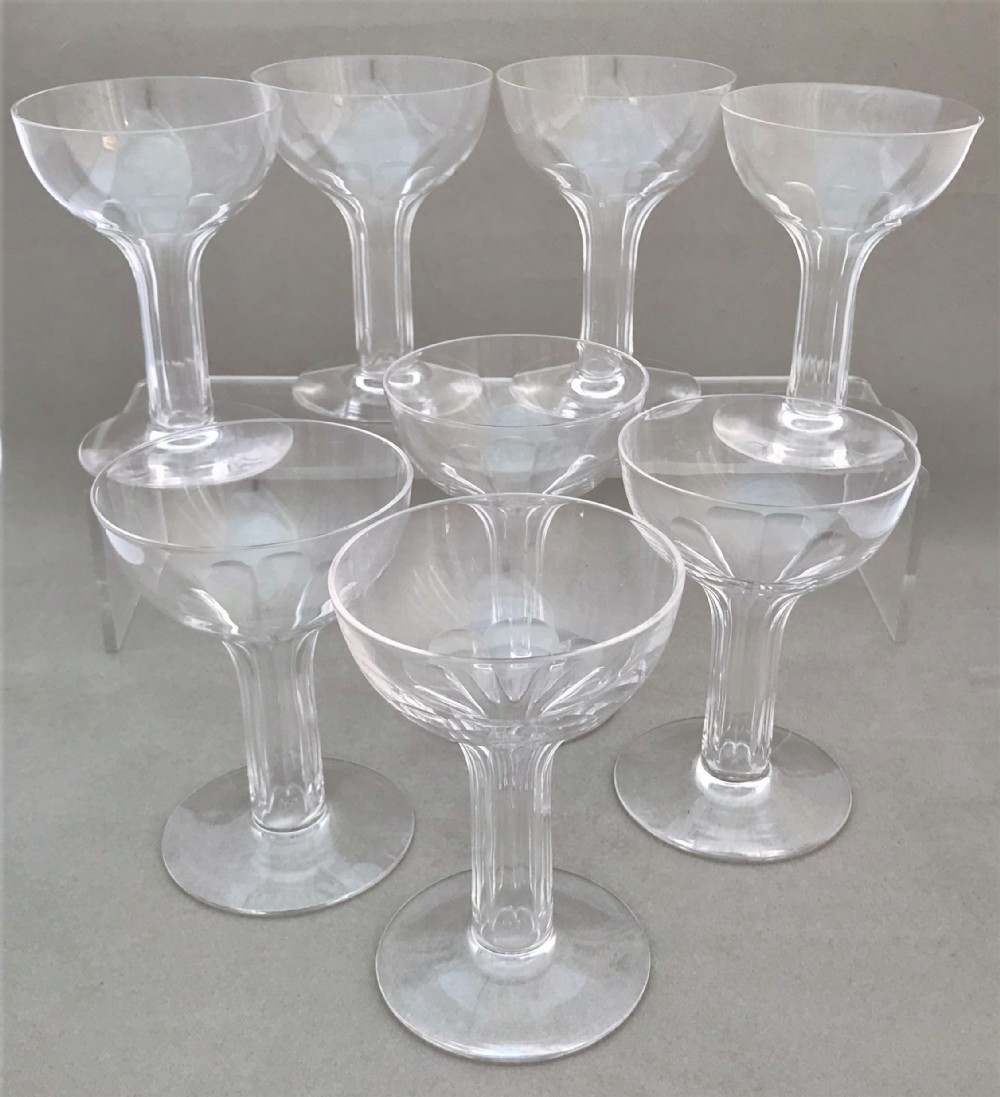 A rare set of eight hollow stem champagne glasses