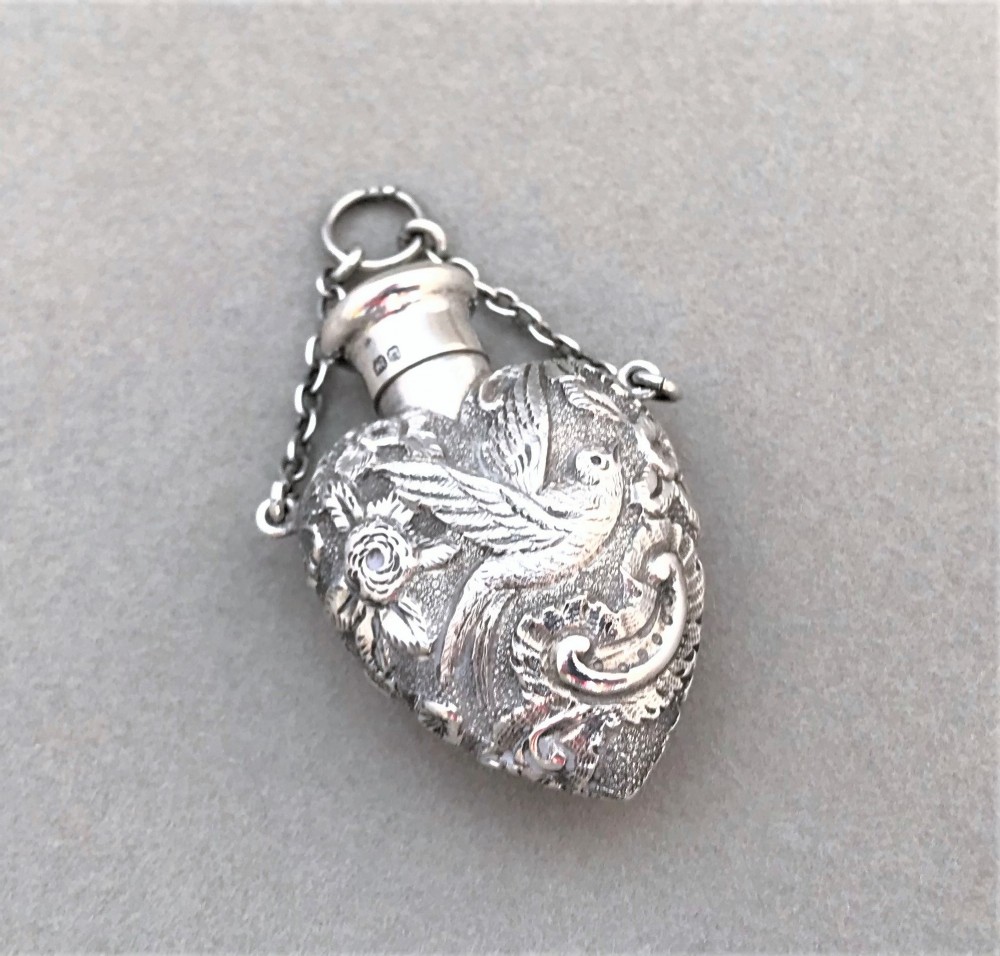 An exquisite silver heart shaped scent bottle by Sampson Mordan