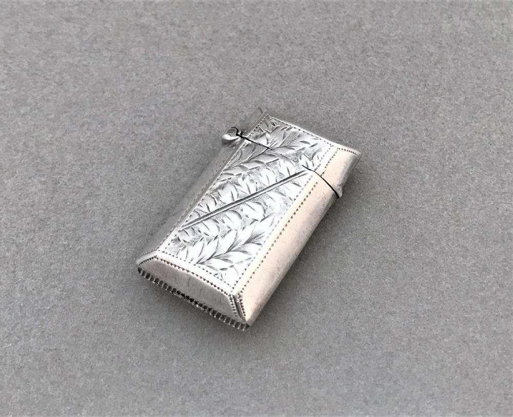 A most unusual small Victorian silver vesta