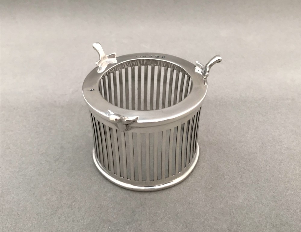 A gorgeous Edwardian silver mounted trio of scent bottles View IX