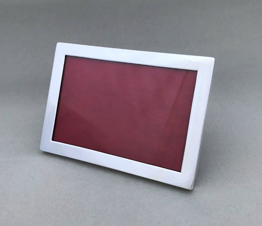 A good Victorian silver landscape photo frame