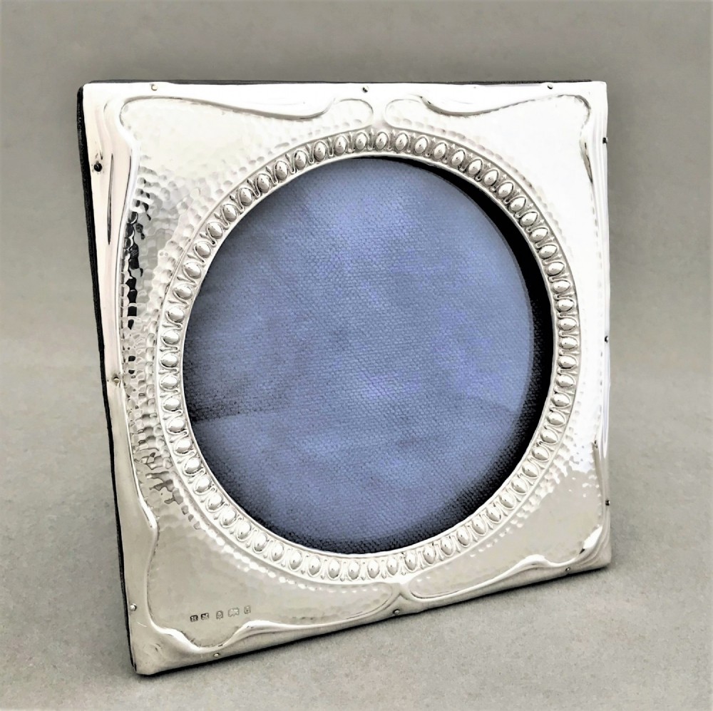 A gorgeous Arts & Crafts silver photo frame