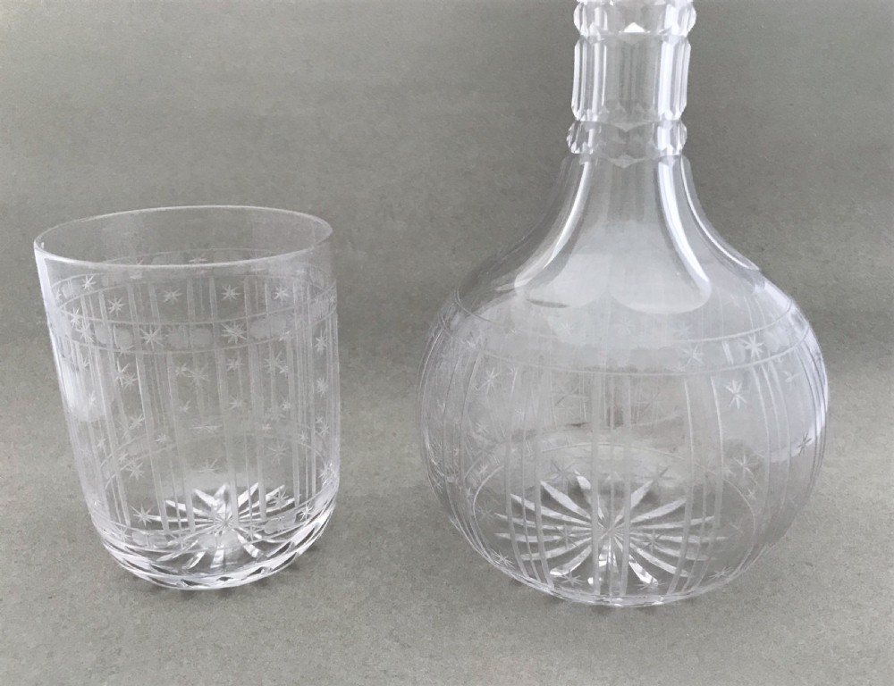 A stunning Victorian star cut carafe and beaker View V