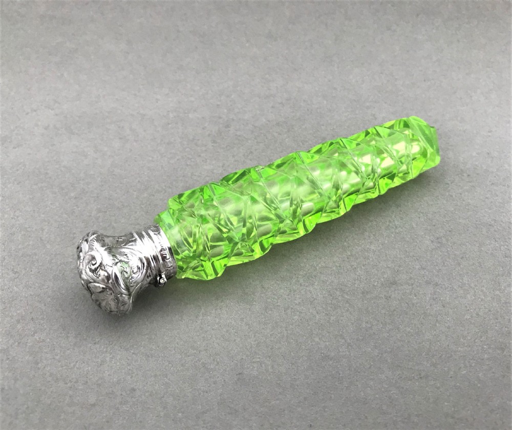 A fabulous Victorian silver mounted uranium scent flask View II
