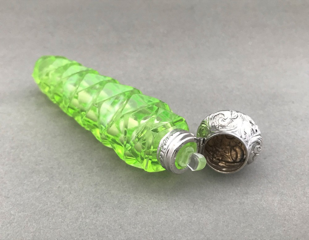 A fabulous Victorian silver mounted uranium scent flask View V