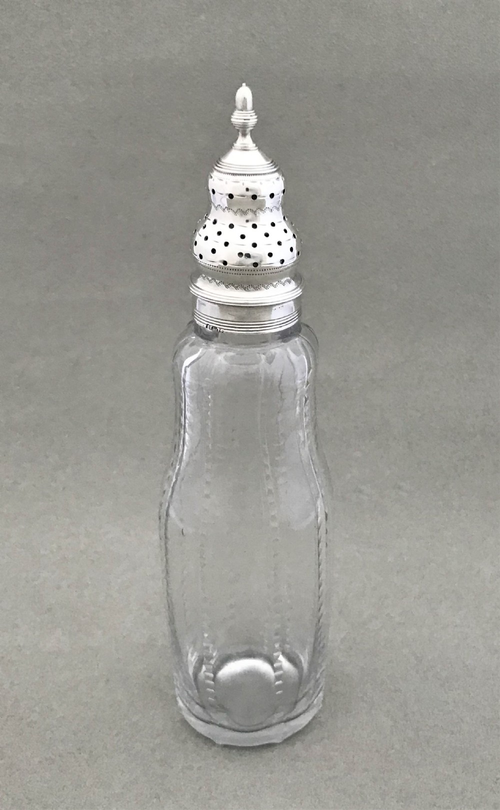 A fine late 18th Century silver mounted caster