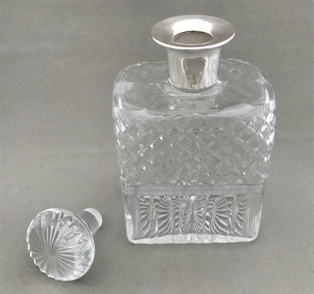 An imposing silver mounted George V decanter View V