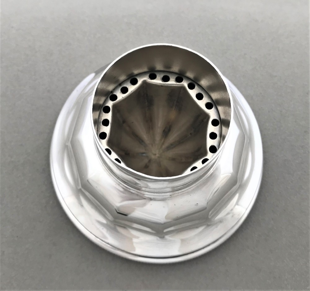 A rare silver plated cocktail shaker with lemon squeezer View VIII