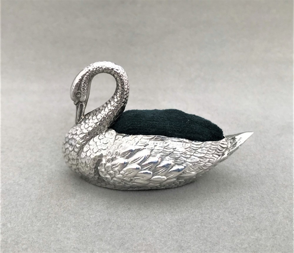A fine Edwardian silver swan pin cushion