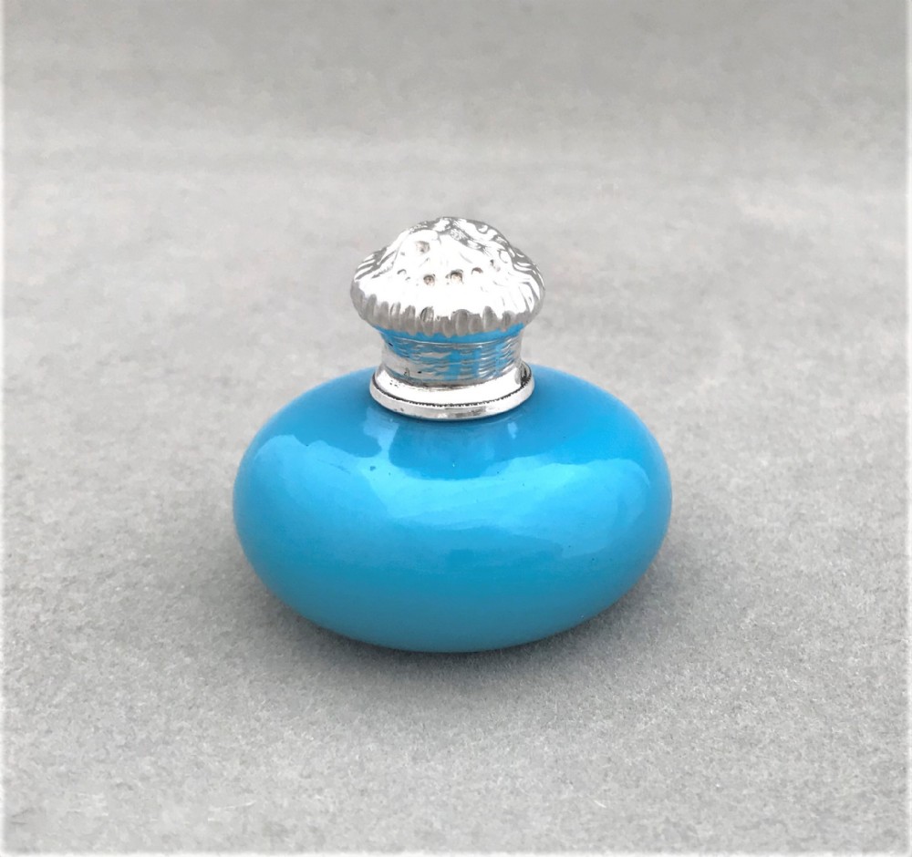A gorgeous silver mounted opaline scent bottle