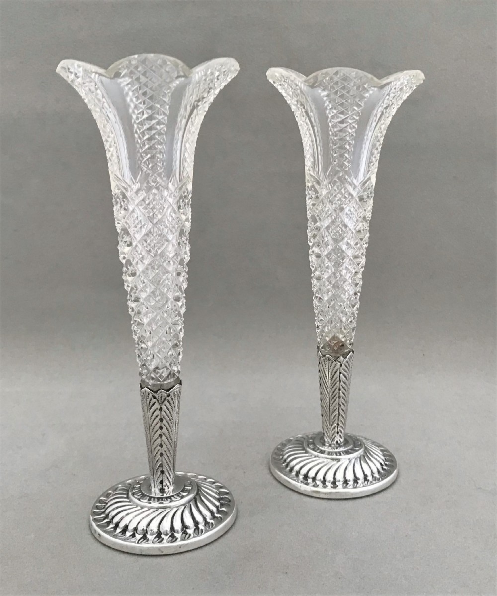 A gorgeous pair of Victorian silver mounted bud vases