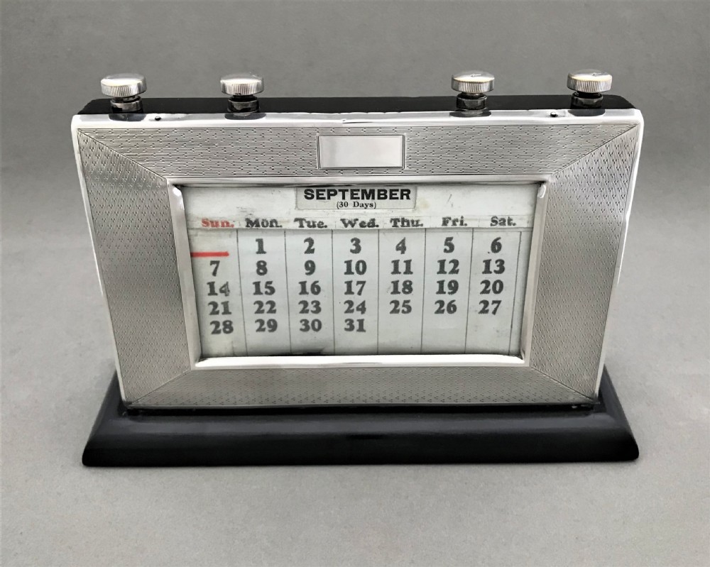 An unusual Art Deco silver perpetual calendar View V