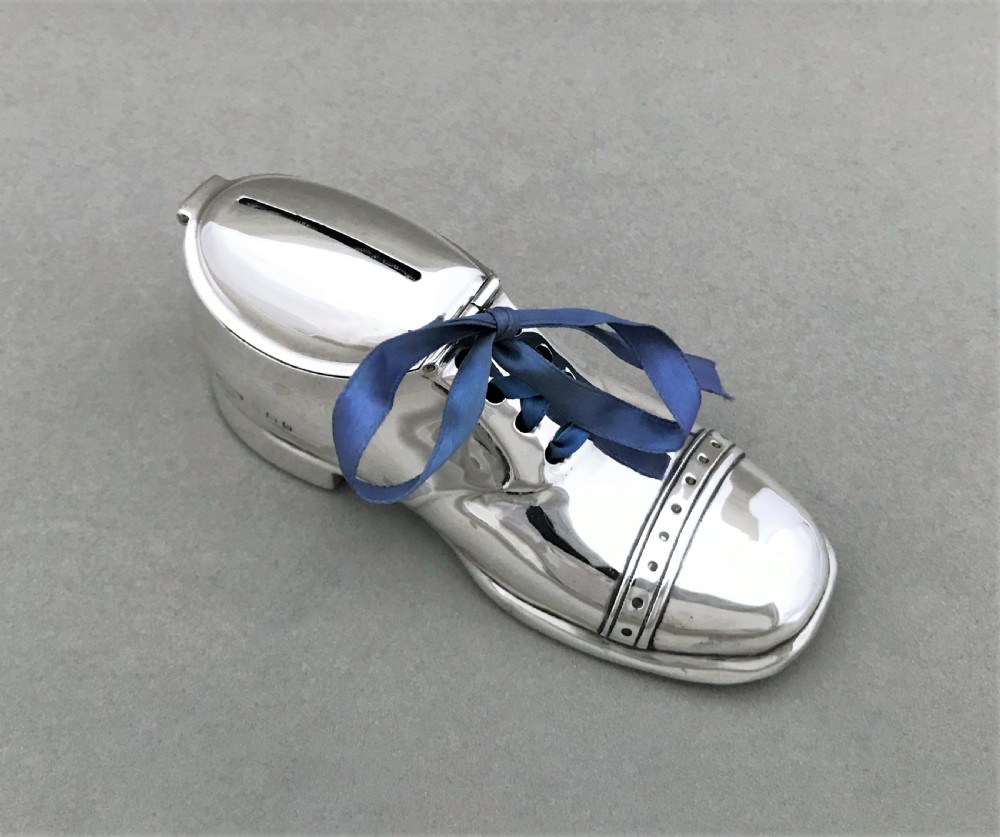 An extremely rare novelty silver 'shoe' money box View III