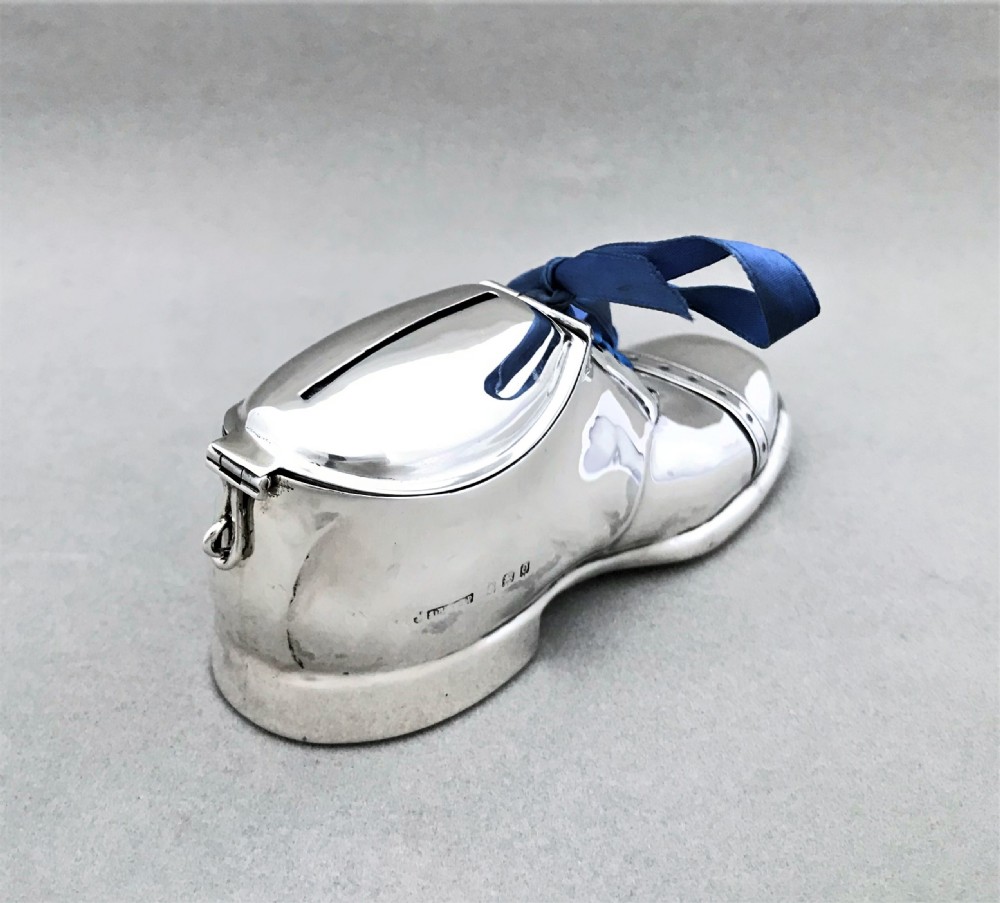 An extremely rare novelty silver 'shoe' money box View IV