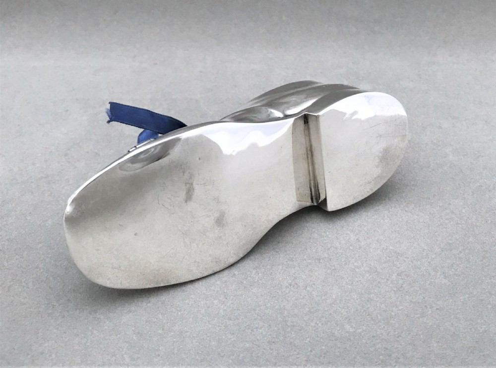 An extremely rare novelty silver 'shoe' money box View VI