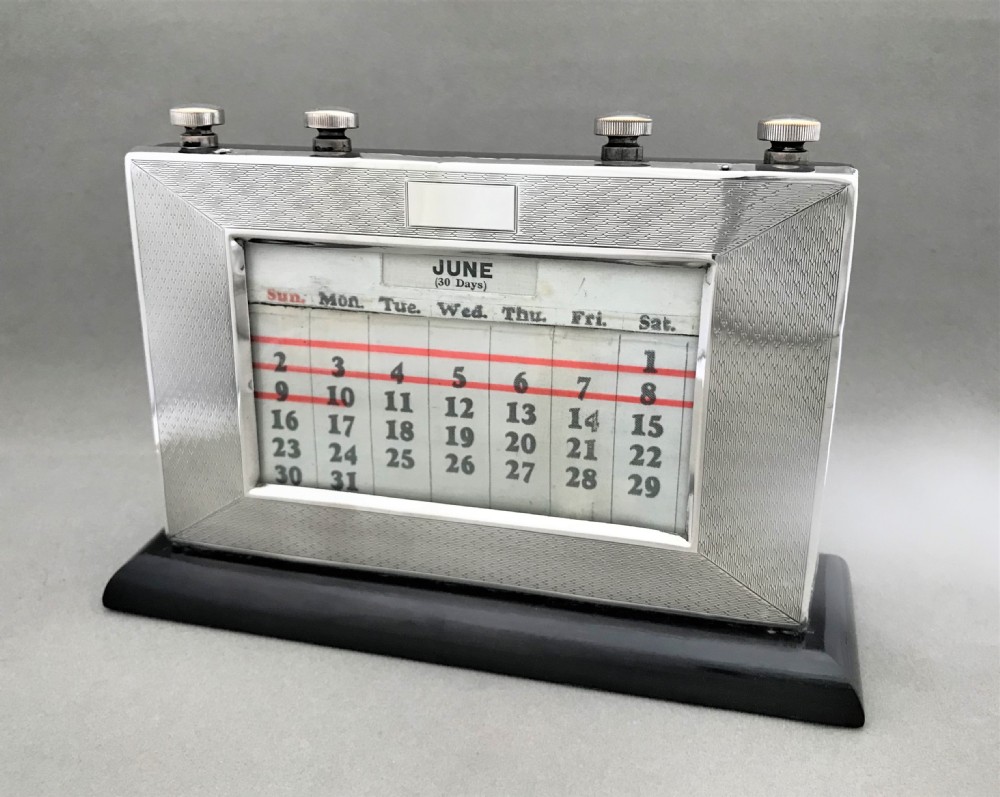 An unusual Art Deco silver perpetual calendar